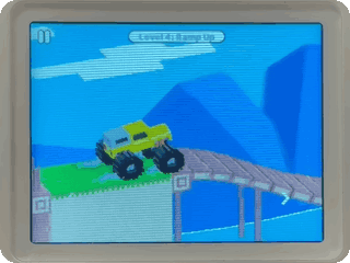 NumDrive on a real NumWorks calculator: a monster truck jumps off a ramp